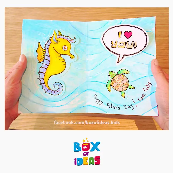 daddy-seahorse-and-baby-turtle-daugther-illustrated-guess-what-bilingual-card-for-Inclusive-Modern-DIY-Fathers-Day-Gift-by-box-of-ideas