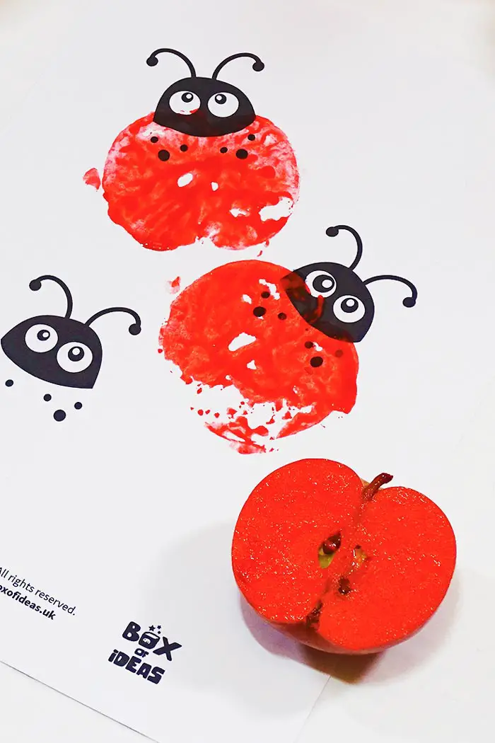 Red Stamped Ladybugs for Bugs and Nature Simple Stamping Art activity for Preschool Kids using Apples. #preschool #crafts #apples #stamped