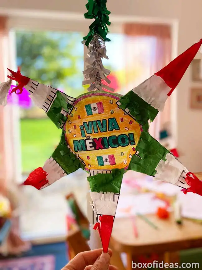 mexican pinata paper decoration hanging off the ceiling